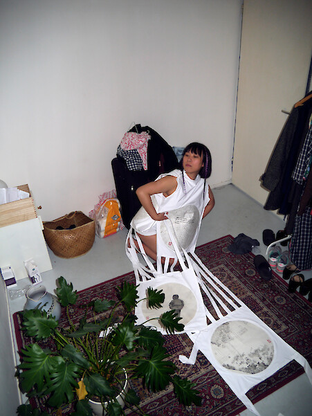 Evelyn Taocheng Wang, *Posing for Banner of Tunnel Security Woman, No. 2,* 2019, Digital C-Print, 42 x 31.5 cm