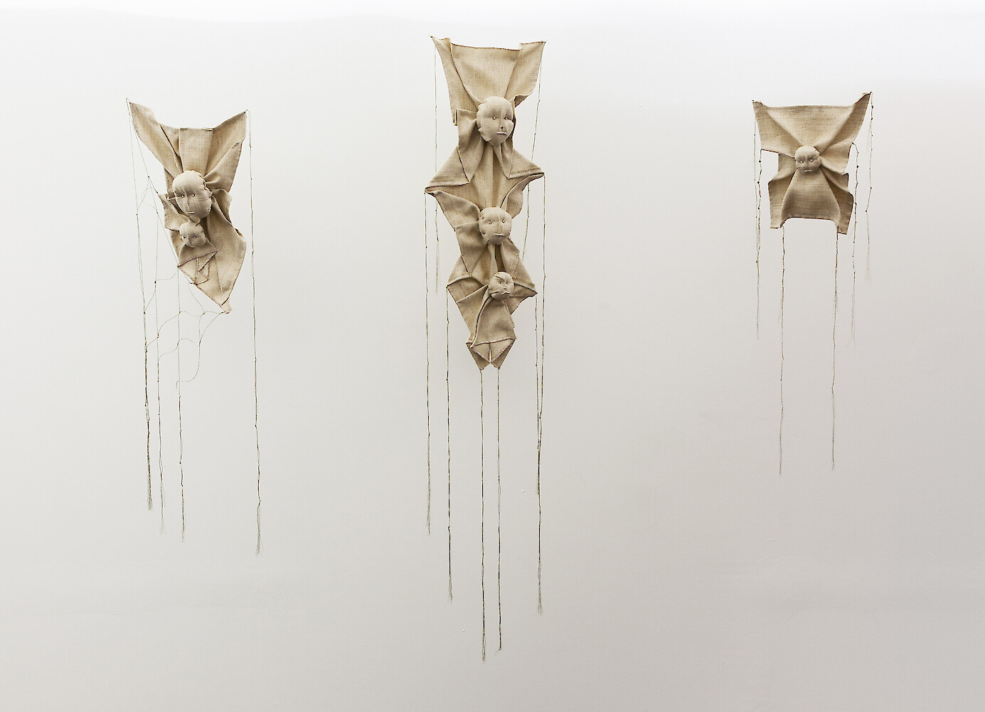 Mindy Rose Schwarz, *Portraits*, 2017, dimensions variable, upholstery fabric, earrings, thread, stuffing