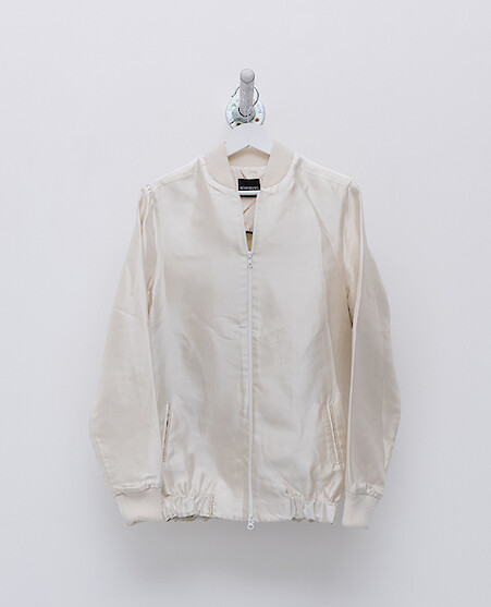 *Marie Angeletti, Untitled,* 2016, Bomber jacket, ‘Mamacita Capsule Collection 2014’ by Alexander Lewis (unique archive sample silk jacket). Embroidery photography by Marie Angeletti of ceramic pot by Lu Wu, Pebeo factory worker, Kunshan, China £ 1190.00