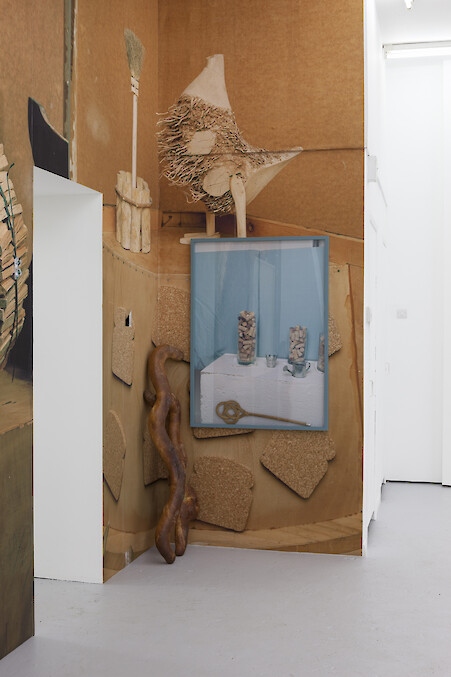 Stefan Burger, *Untitled (Jealousy, hate, enviousness, grudge, anxiety, suspicion, ambush)* 2015, framed photographs, wallpaper, bread, Installation view