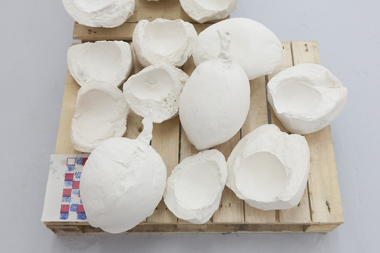 Oscar Murillo, *another kind of breed* (detail), 2014, Wooden crates and porcelain 34 x 72 x 183 cm