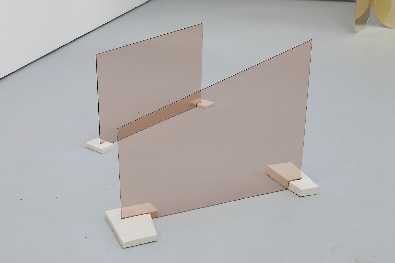 *Desires are already memories*, 2013, Toughened glass, jesmonite, 60 x 110.5 x 15 cm and 81 x 110 x 39 cm