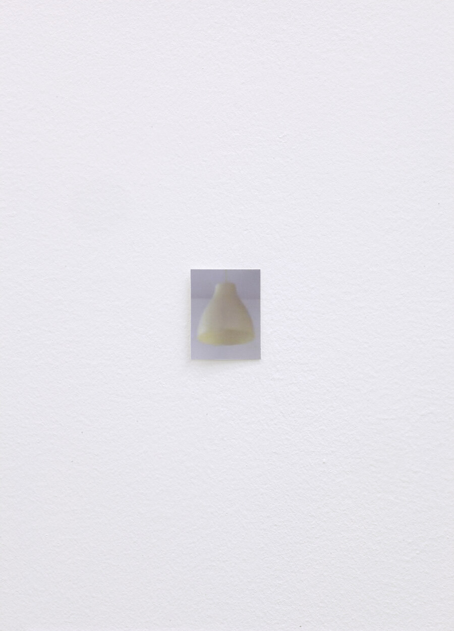 *Lamp Looks in Different Light*, 2013, 6 inkjet prints, 3.5 x 4.5 cm