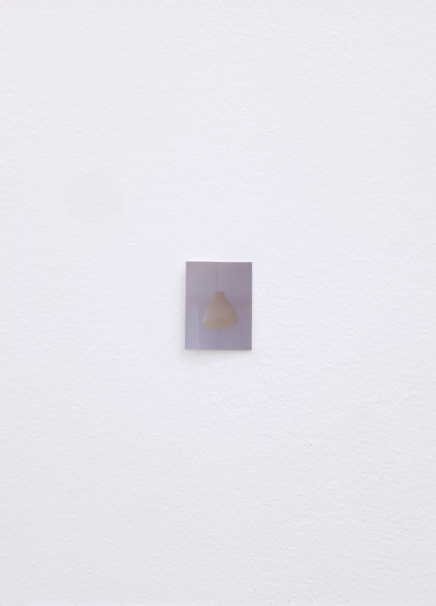 *Lamp Looks in Different Light*, 2013, 6 inkjet prints, 3.5 x 4.5 cm