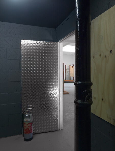 Lloyd Corporation, *Interior Music*, 2011, Beovision 1 television, video (10:53mins), pine boarding, concrete, aluminium treadplate, fire extinguisher, MDF