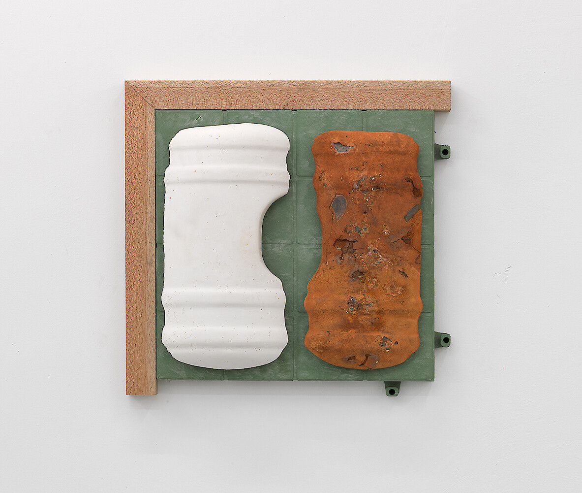 Lloyd Corporation, *Janus (280 B.C – 2090 A.D)*, 2011, Miranti, plastic flooring unit, plaster, terracotta cast with iron fillings, 48 x 48 cm