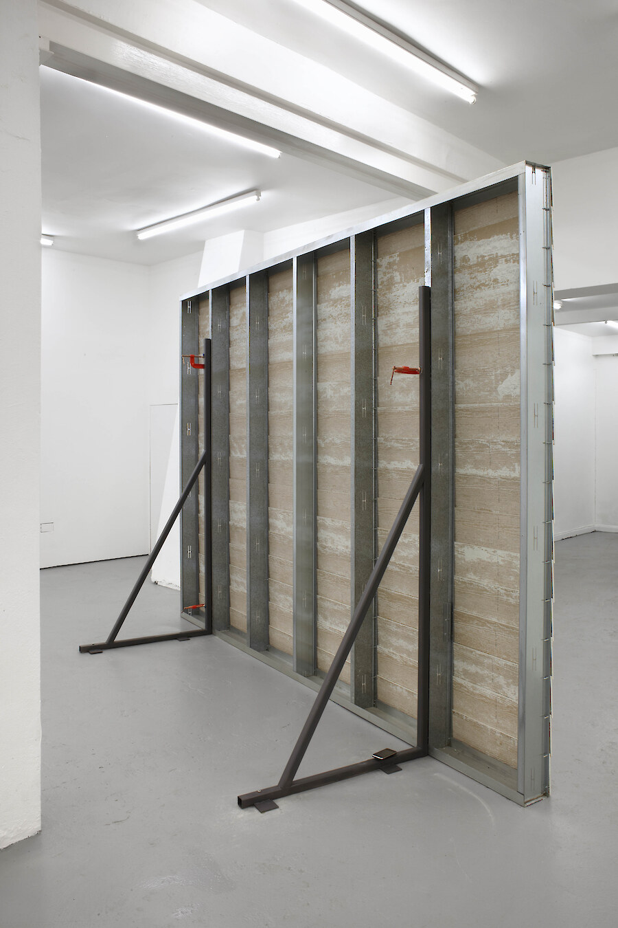 Ed Fornieles, *Monster*, 2011, Hardiplank lapsiding, metal studwork, clamps, iPhone 3G, 261 x 360 x 112 cm