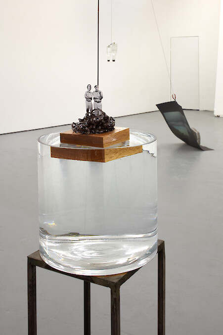 Chooc Ly Tan, *It Depends Mostly On the Slant Of Interplanetary Magnetic Field Lines*, 2012, Mixed media installation with cassette tape, music stand, video projector, water, Plexiglass, two fluorescent lights (detail)